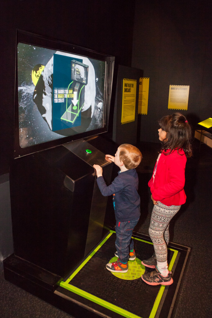 Creating meteorites at Scienceworks' Tyrannosaurs Meet the_Family exhibition. Picture by Mark Gambino.