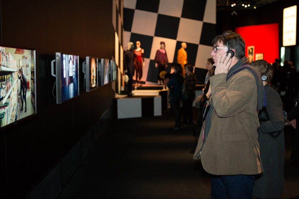 Headsets allow visitors to listen to the audio. David Bowie Is. Photo by Mark_Gambino-