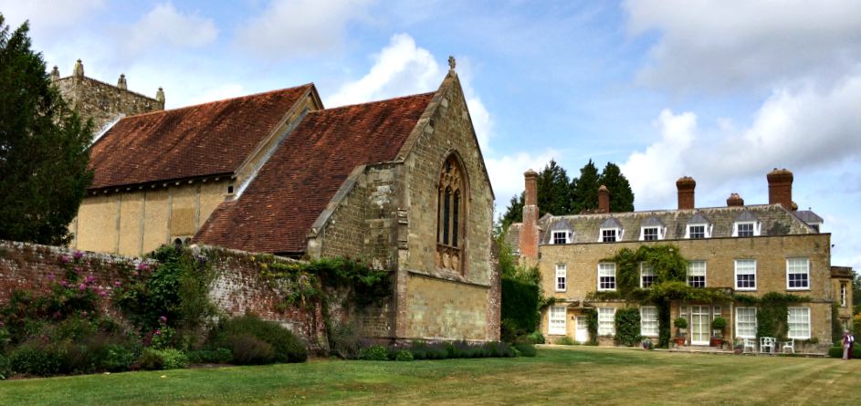The house and church at Woolbeding Gardens.