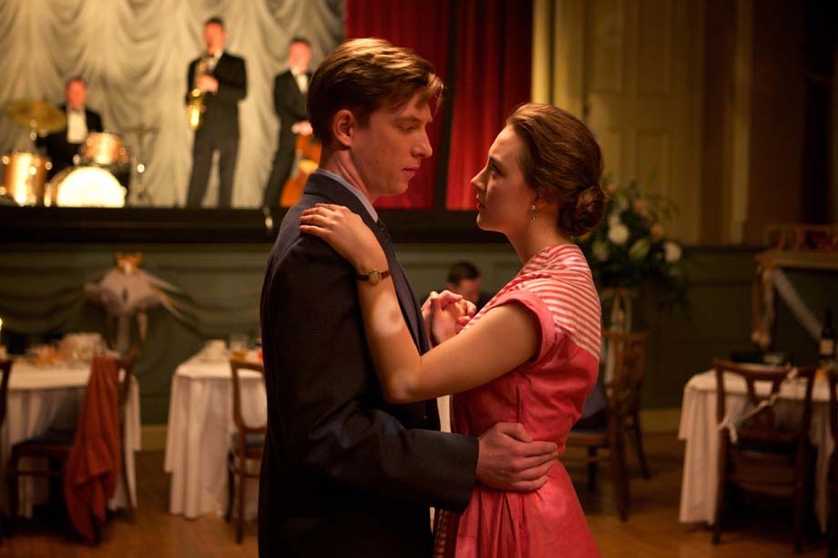 Domhnall Gleeson as "Jim" and Saoirse Ronan as "Eilis" in BROOKLYN. Photo by Kerry Brown. © 2015 Twentieth Century Fox Film Corporation All Rights Reserved