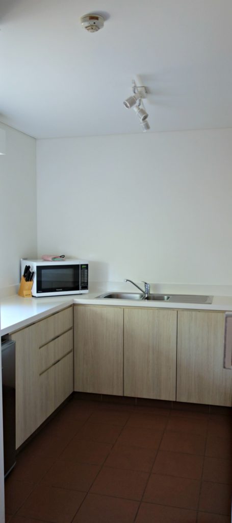 The kitchen at Emu Walk Apartments.